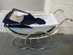 Braley's Osheath vintage pram in navy and cream with hood and cover,