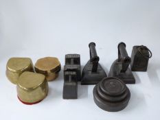 Three brass denture moulds or similar, two marked ADCO one Cotterell & Co,