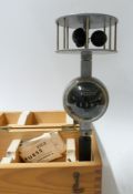 A hand anemometer by R Fuss,
