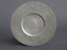 Pewter platter with crest to top,