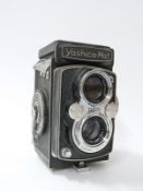 A Yashica-mat TLR Copal MXV camera in leather case