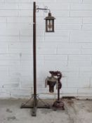 An oak standard lamp and a Chinese lamp