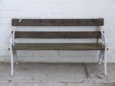 Cast iron garden table (L154cm) together with a bench and two matching chairs