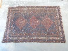 Turkoman rug on brown ground,