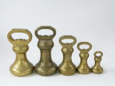 Run of brass or bronze bell weights 4lb to 8oz together with a Parnall Bristol 4lb bell weight