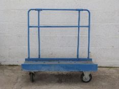 A blue four wheel trolley,
