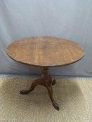 A 19thC mahogany tilt top table raised on a tripod base, diameter 90,