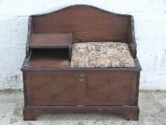 An oak telephone seat,