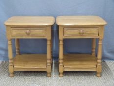 A pair of Ercol Windsor light elm lamp tables each with single drawer,