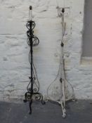 Two wrought iron standard lamps,