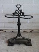 A cast iron stick/umbrella stand