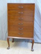 A mahogany six drawer music cabinet / chest raised on cabriole legs,