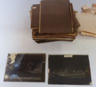 A collection of photographic glass negatives,