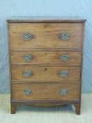 A George III mahogany secretaire with leather inset fall flap revealing a fitted interior over