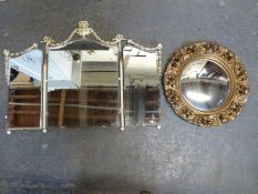 An ornate convex butler's mirror and a dressing table mirror,