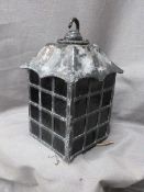A leaded stained glass electric porch light, probably Arts & Crafts era,