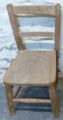 A child's elm seated chair,