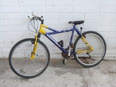 King Fox blue and yellow mountain bike with front suspension