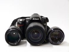 Nikon D80 DSLR camera with Nikon DX Nikkor 18-135mm lens, 50mm 1:1.4 and 105mm 1:2.