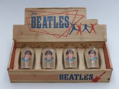 Set of four Beatles portrait glasses by Joseph Lang,