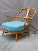 Ercol light elm easy chair with blue cushion