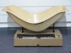 W & T Avery baby weigher with moulded plastic basket