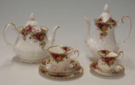 Royal Albert Old County Roses tea, coffee and dinnerware, approximately 60 pieces including a clock,