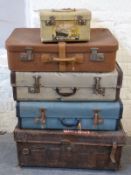 Five vintage leather and other cases some with liner and railway labels,