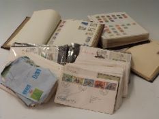 Three albums of Commonwealth and foreign stamps and a quantity of first day covers,