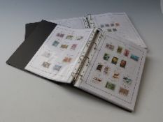 A collection of India stamps in two albums