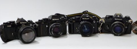 Nikon FA SLR camera with Tamron 1:2.5 24mm lens, Nikon FM2 with Sirius 1:3.5-4.