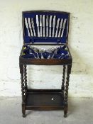 An oak cased six place setting of Kings pattern cutlery in stand,