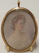 Early 20thC portrait miniature young woman with flowers in her hair