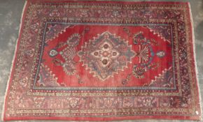 Turkoman woollen rug on wine ground,
