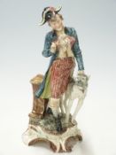 Continental figure of a dandy with dog