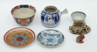 A quantity of Oriental ceramics including tea bowl, teapot, saucers,