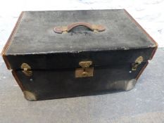 A 19thC leather bound travelling trunk with lift out tray and leather handle by Winsall and Sons,