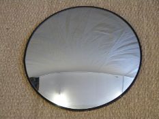A circular convex security mirror,