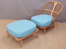 Ercol light elm easy chair with blue cushions,