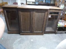 A 19thC breakfront cupboard,