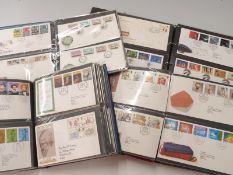 Four albums of GB first day covers
