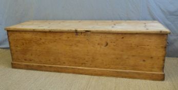 An exceptionally large 19thC pine trunk with looped carry handles,