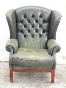 Chesterfield style leather button back wing armchair