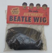 Beatles 'The Only Authentic Beatle Wig' fits all head sizes,