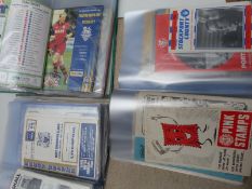 One-hundred and fifty various football programmes including Manchester United Review, Swindon,