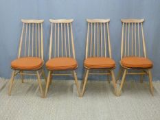 A set of four retro Ercol light elm stick back dining chairs with cushions