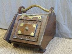 A 19thC brass and rosewood coal scuttle
