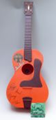 Beatles New Beat plastic guitar with a Selmar Hofner Beatles guitar string