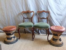 A pair of Victorian rosewood dining chairs,