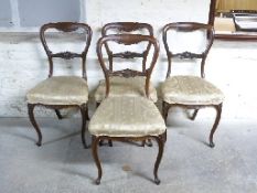 Four Victorian mahogany balloon back chairs